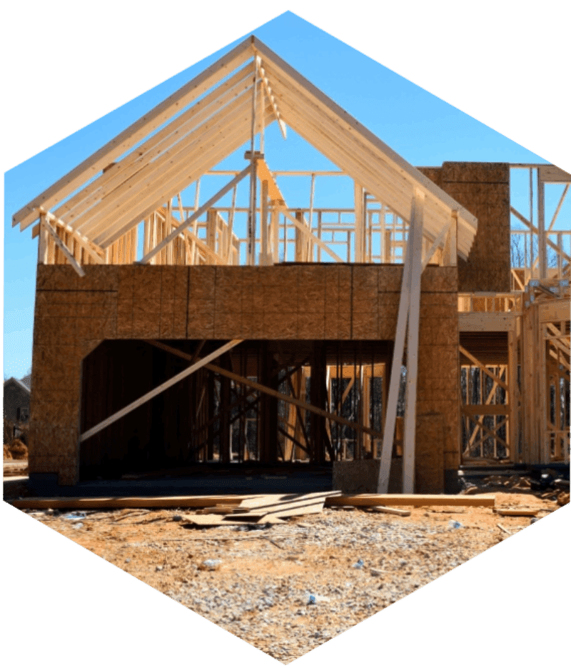 A building under construction with some wooden beams.